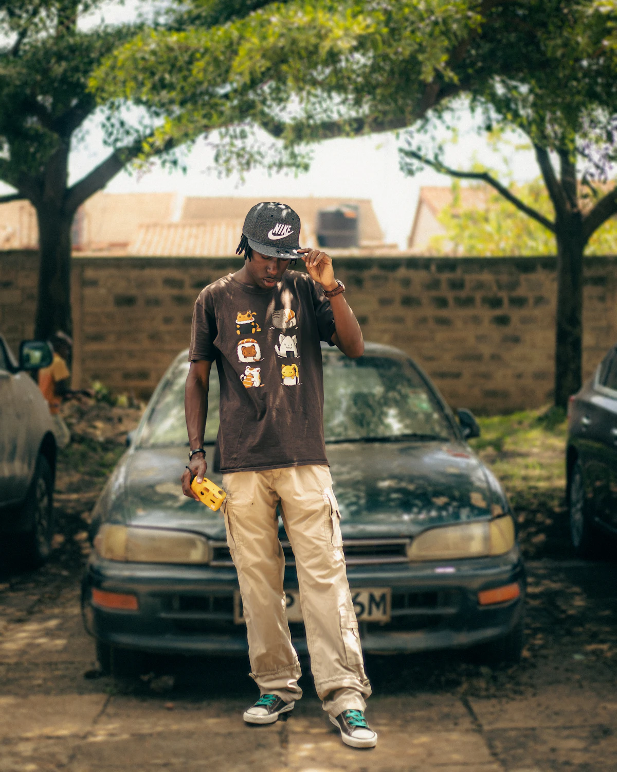 Man on the phone in Nairobi giving a client update